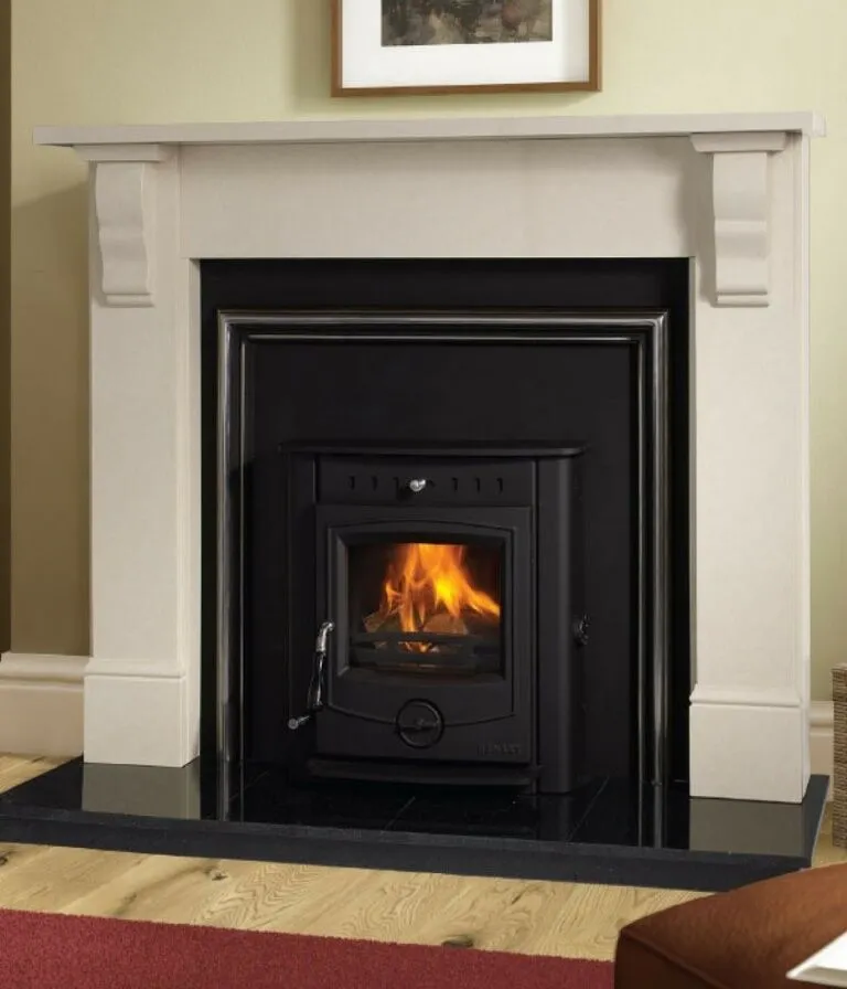 Henley Achill Inset stove in a fireplace.