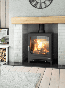 Henley Sherwood 12kw woodburning boiler stove in small aclove.