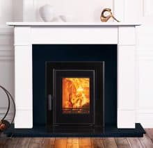 Atlantic Wave inset cassette stove in a fireplace.